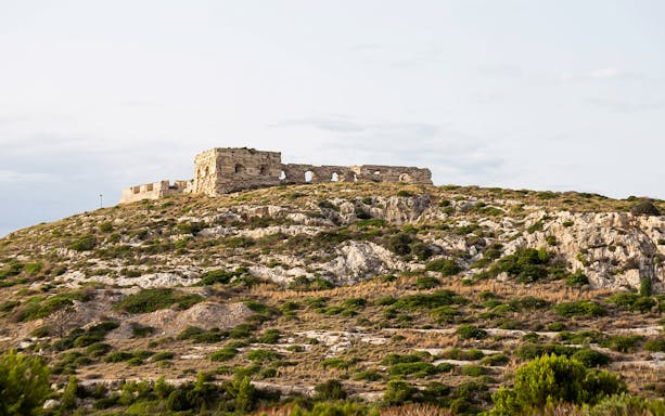 Ruins on a hill during a trek in Colle of Sant'Elia, Sardinia.