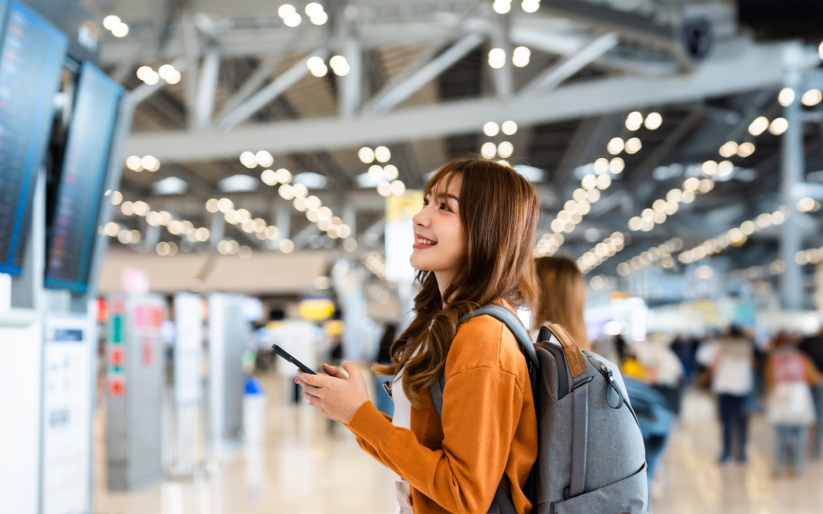Young asian woman in international airport