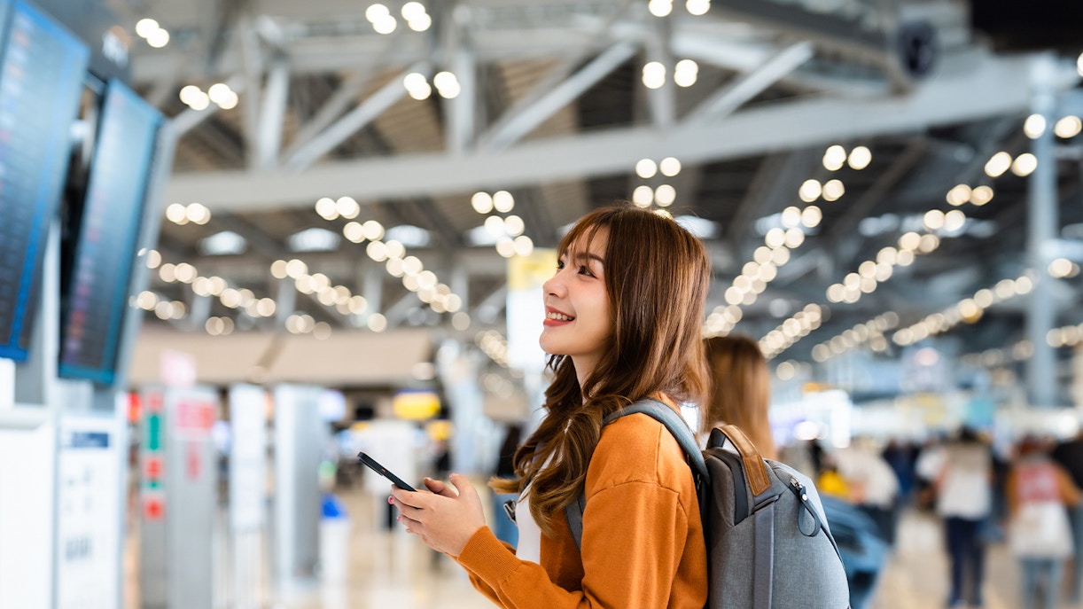 Young asian woman in international airport