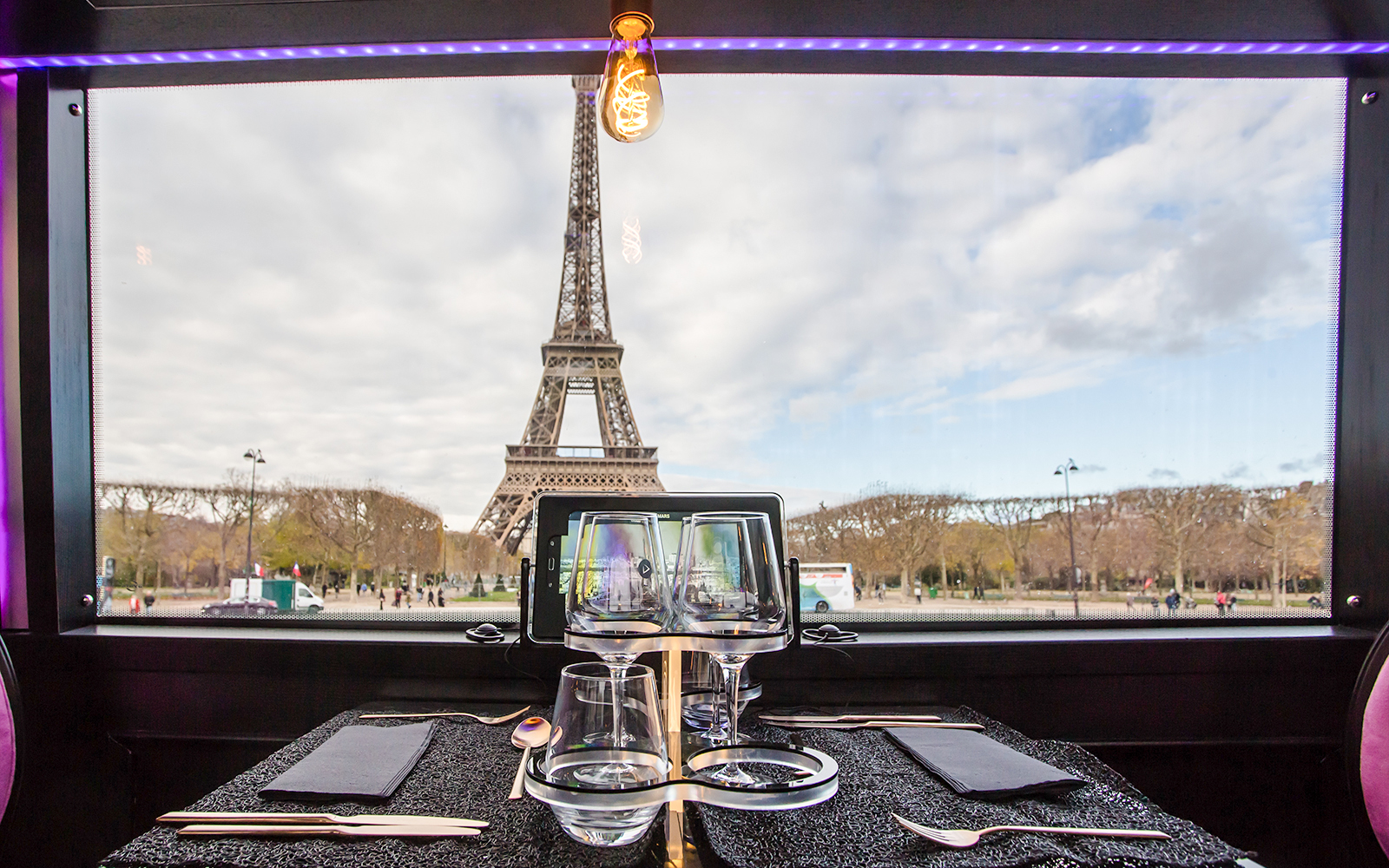 Dining table view of Eiffel Tower from Bus Toqué in Paris.