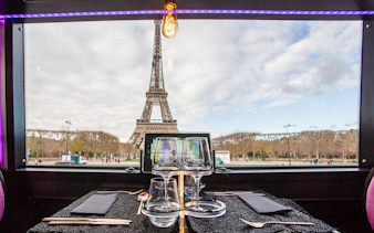 Dining table view of Eiffel Tower from Bus Toqué in Paris.