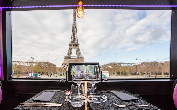 Dining table view of Eiffel Tower from Bus Toqué in Paris.