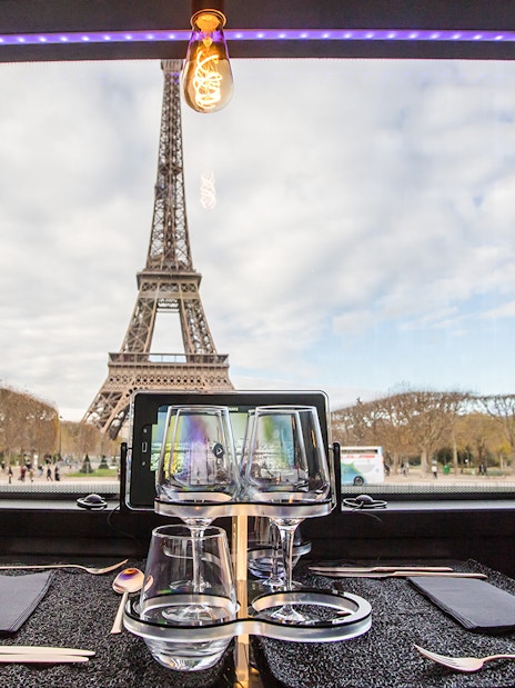 Dining table view of Eiffel Tower from Bus Toqué in Paris.