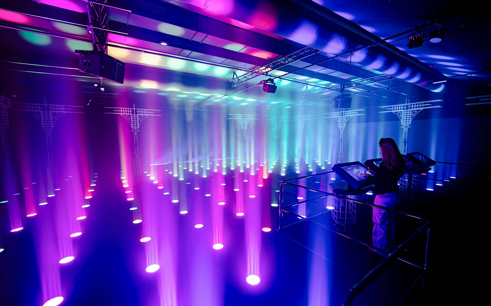 Interactive light installation at Amaze Amsterdam with visitor using control panel.