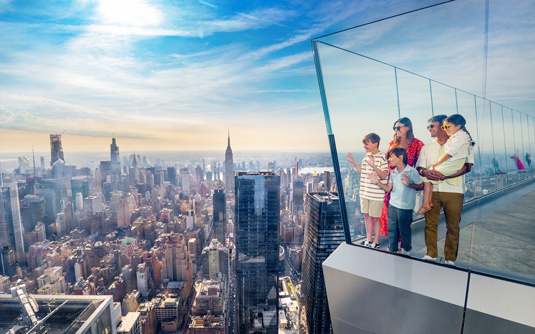 Family enjoying New York City skyline from Edge Observation Deck.