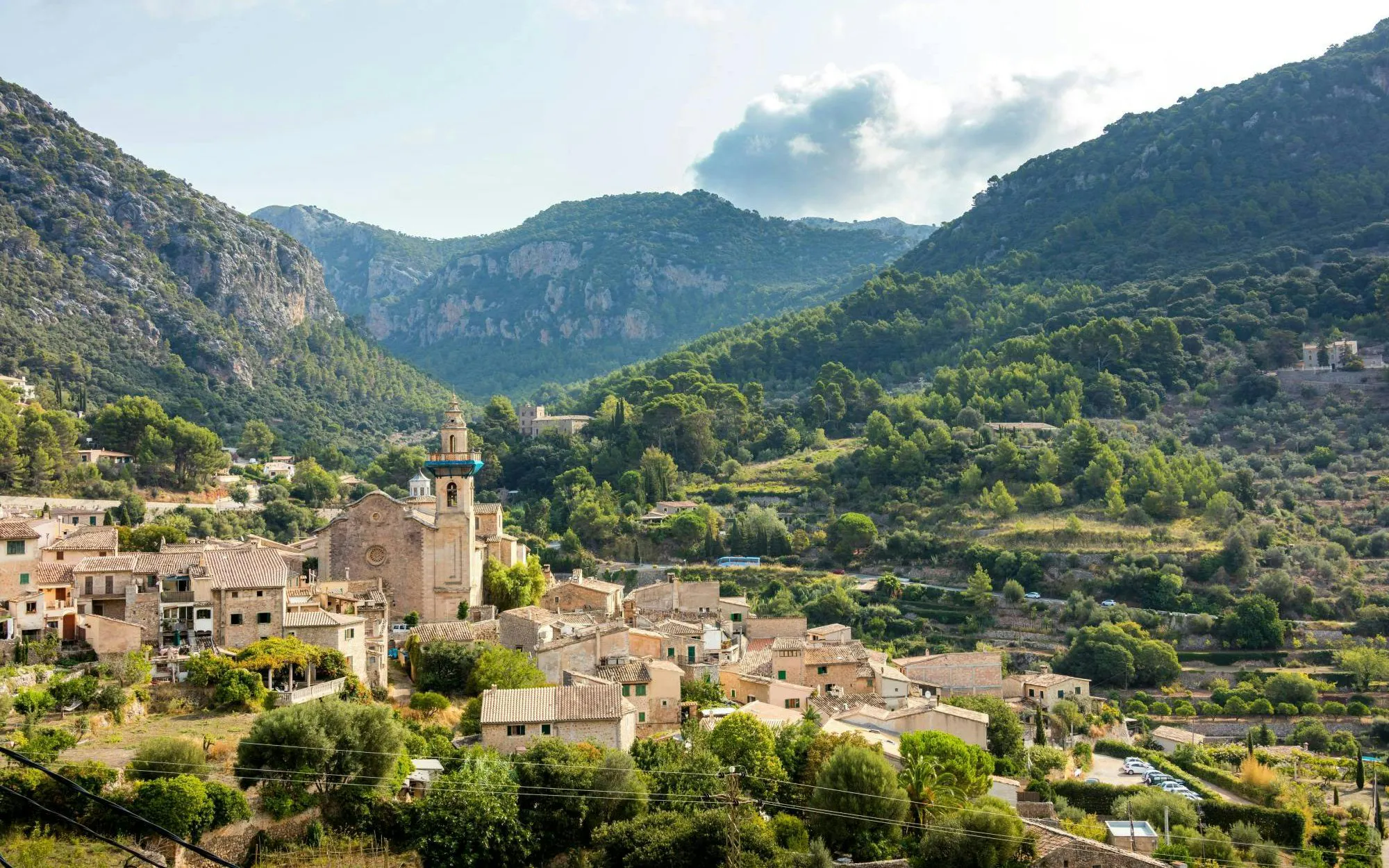 Valldemossa Charterhouse surrounded by mountains in Mallorca, Spain.