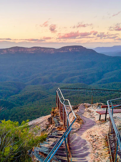 Blue Mountains lookout at sunset with scenic valley view, Sydney to Blue Mountain Tours.