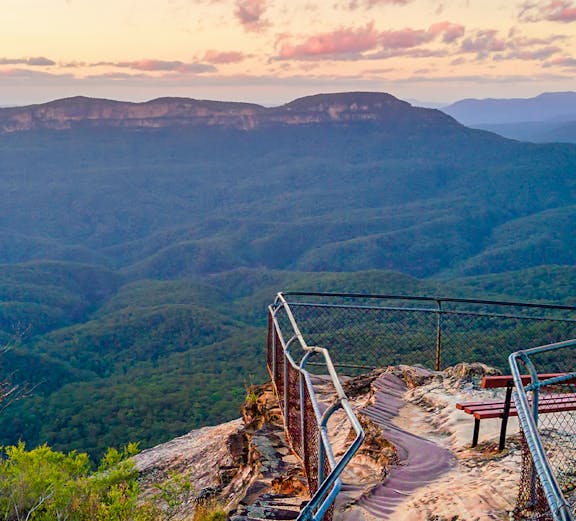 Blue Mountains lookout at sunset with scenic valley view, Sydney to Blue Mountain Tours.