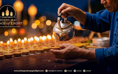 Pouring wax into candle molds during Chiang Mai Voyage of Light festival.