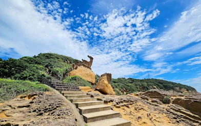 Stairs leading to Marine Bird Rock in Yehliu Geopark, Wanli District, Taiwan.