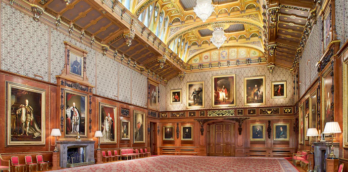 Waterloo Chamber in Windsor Castle with portraits and ornate ceiling.