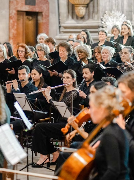 Choir and orchestra performing at Church of St Madeleine, Paris.