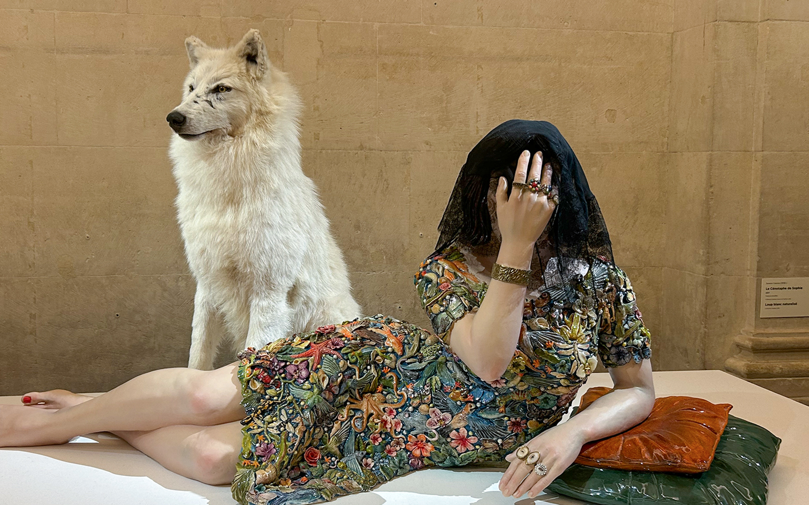 Sculpture of a veiled woman with a wolf at Picasso Museum, Barcelona.