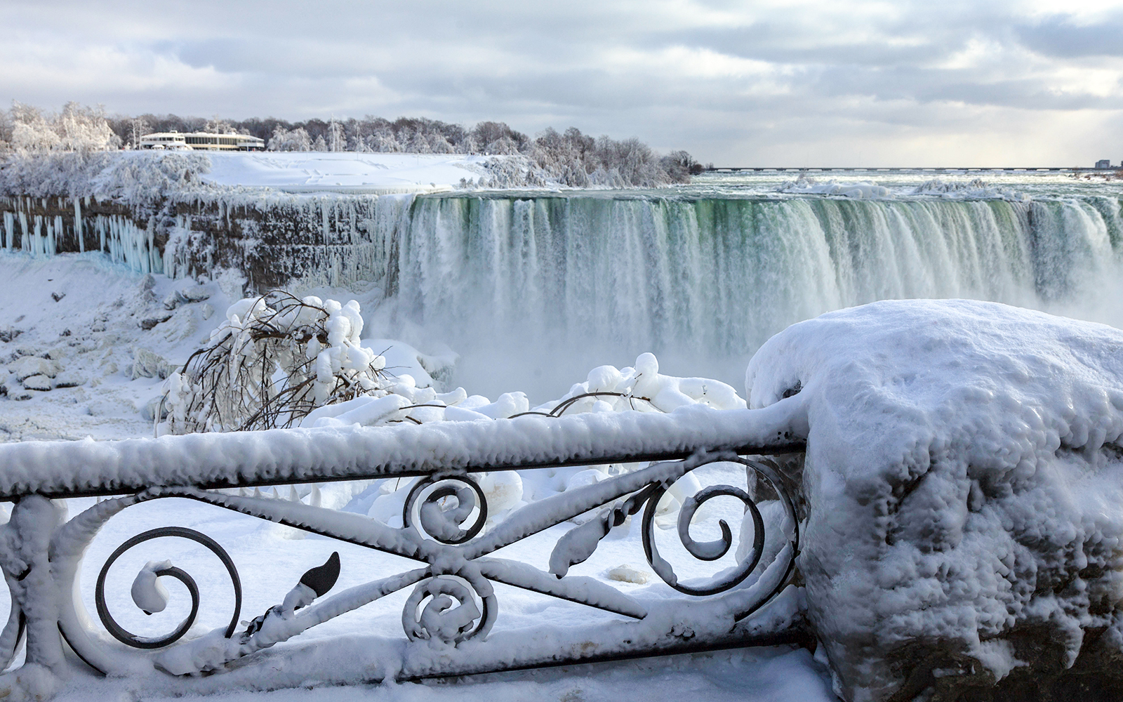 Niagara Falls with autumn foliage and mist in february.
