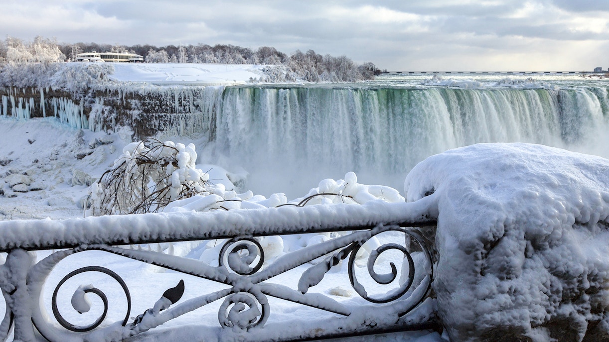 Niagara Falls with autumn foliage and mist in february.