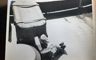 Person relaxing on deck chair aboard Battleship IOWA during guided tour.