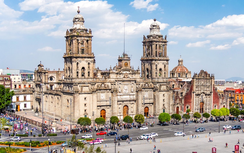 Metropolitan Cathedral facade with tourists in Historic Centre of Mexico City.