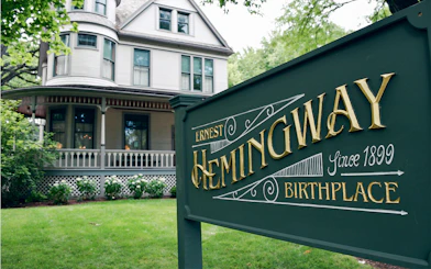 Ernest Hemingway Birthplace in Chicago with historic house in background.