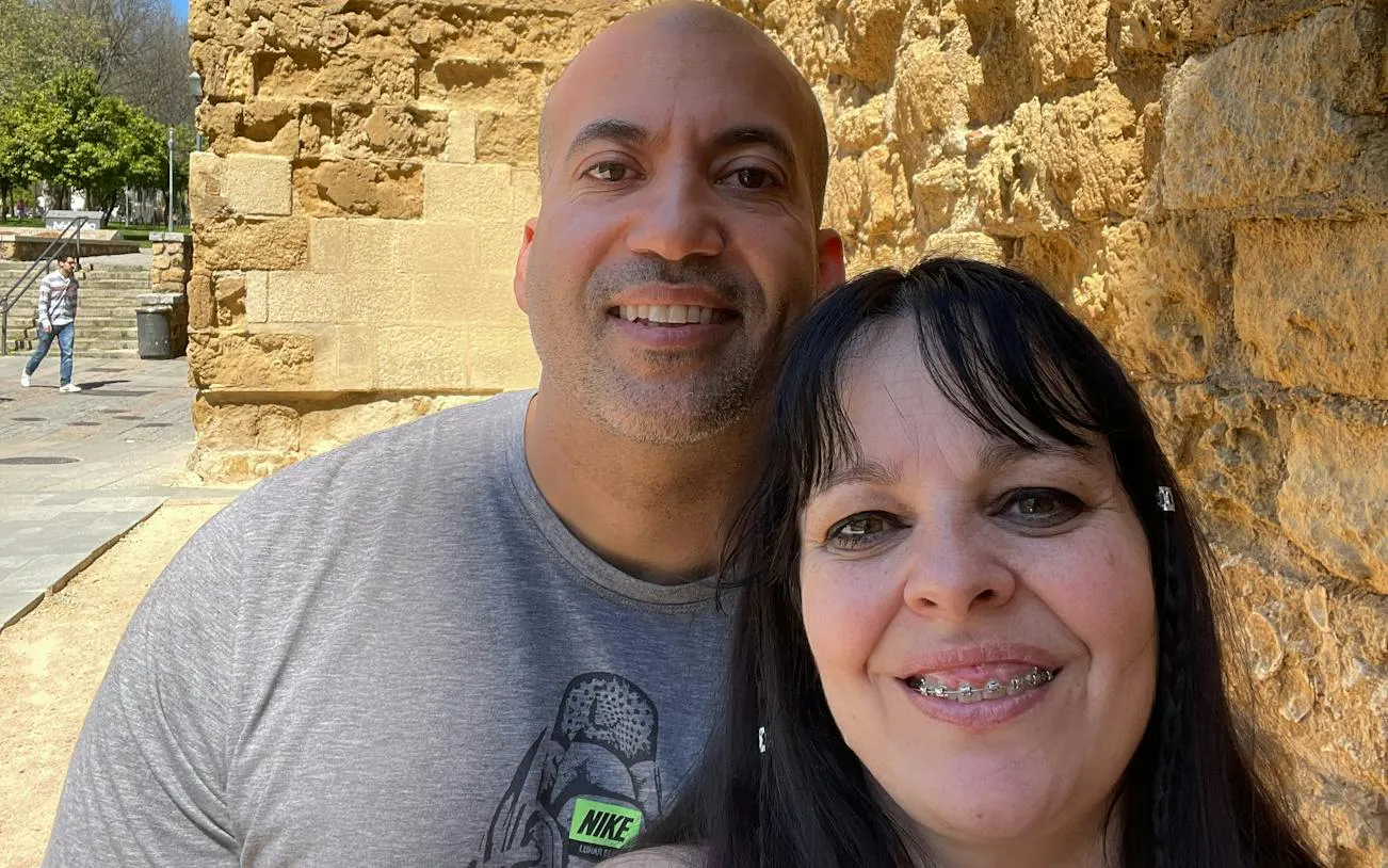 Couple exploring historic stone walls during Córdoba Treasure Hunt, Cordoba.
