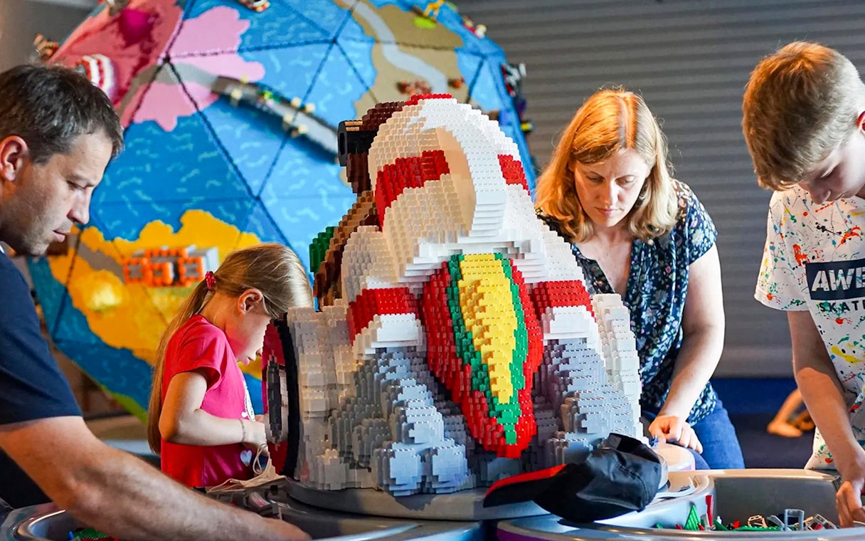Guests building with LEGO bricks at LEGOLAND Deutschland.