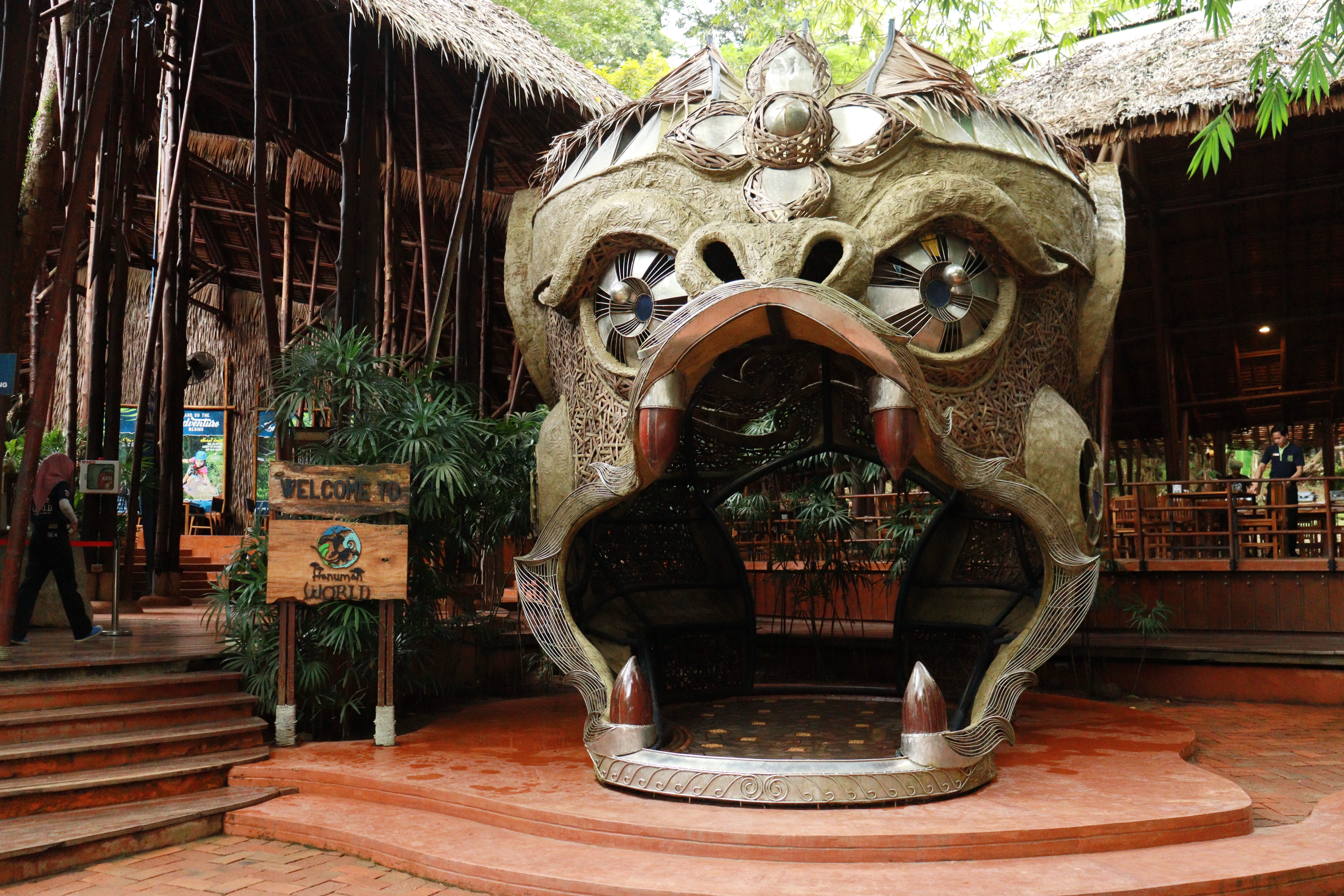 Entrance sculpture at Hanuman World, Phuket, featuring a large ornate monkey head.