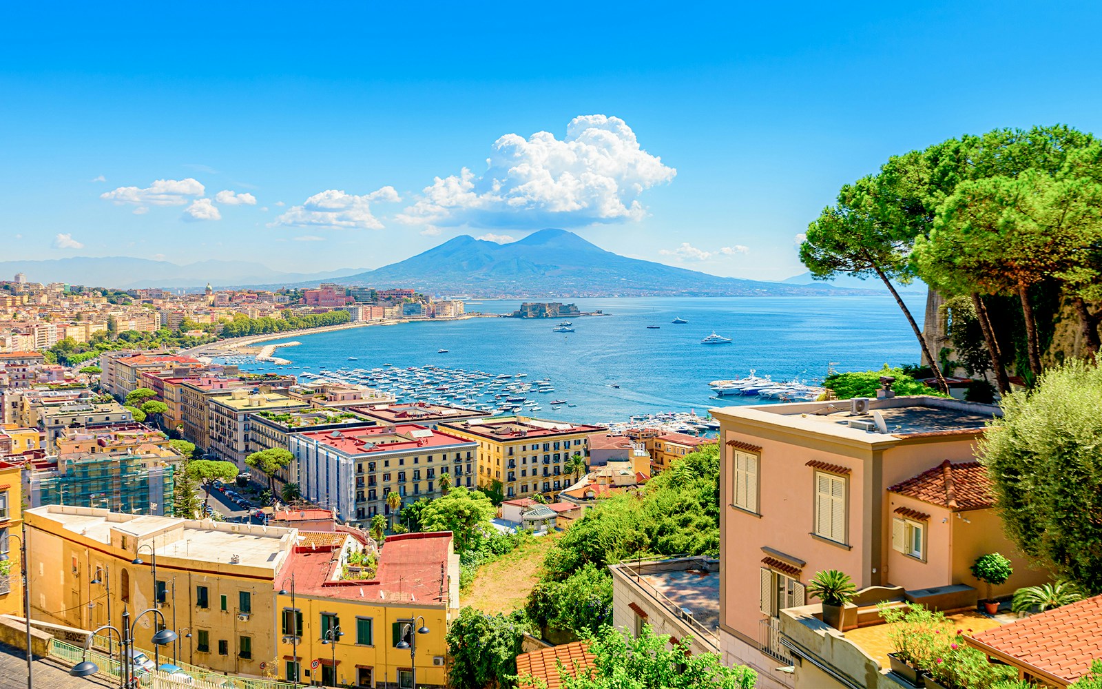 Gulf of Naples view from Posillipo Hill, showcasing coastal landscape and cityscape.