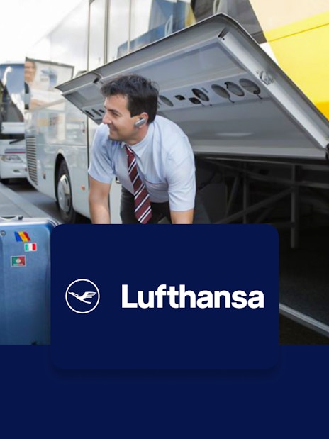 Lufthansa bus loading luggage for round-trip Munich Airport transfer.