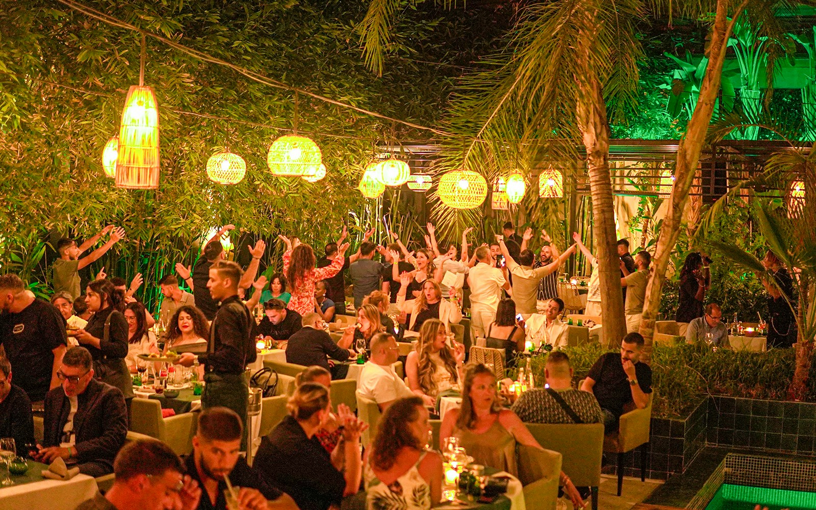 Performer entertaining guests at Nouba Restaurant Dinner Show.