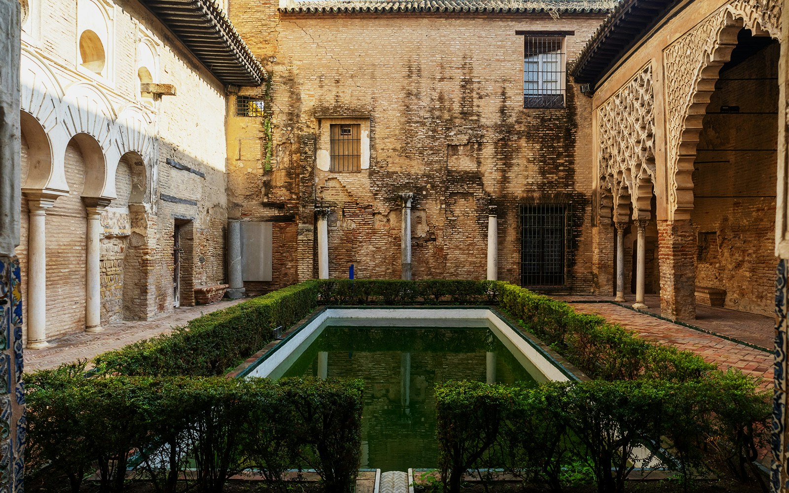 Mercury Pool in Alhambra, Spain, reflecting historic architecture.