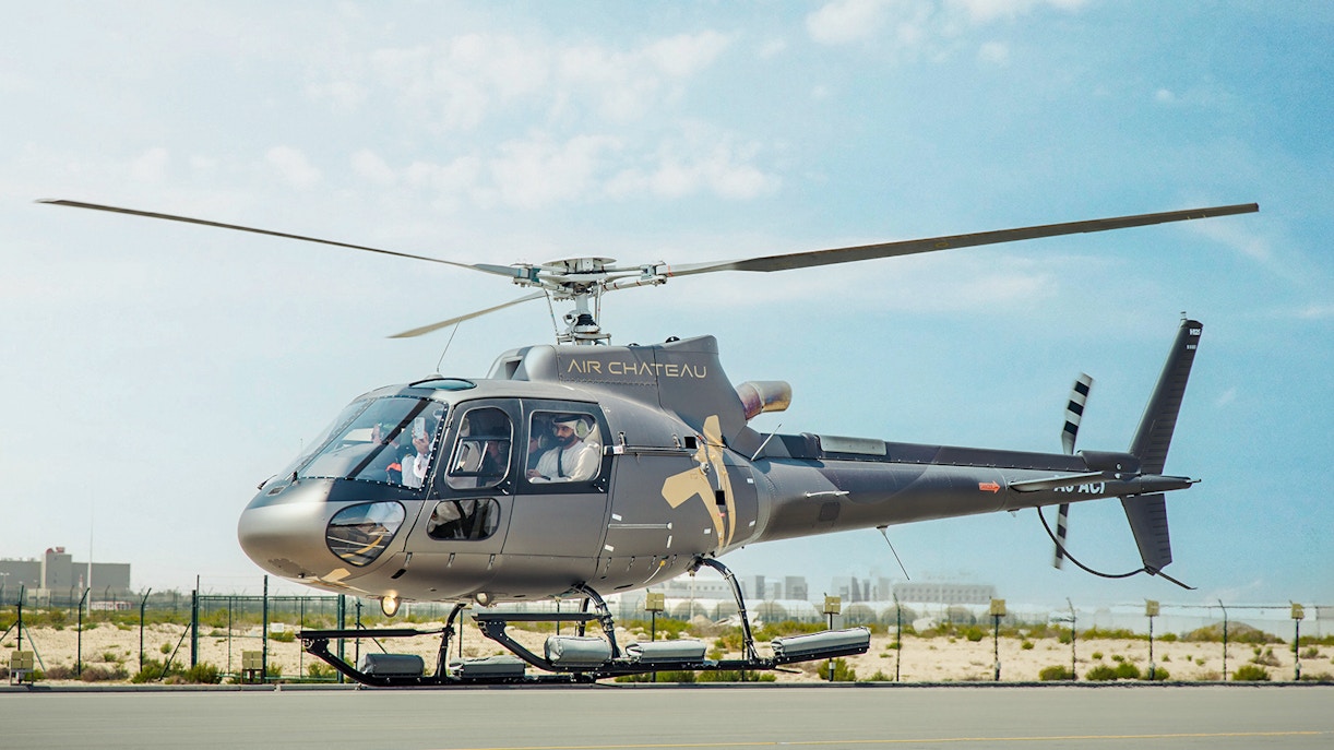 Helicopter on tarmac ready for tour with return transfer.