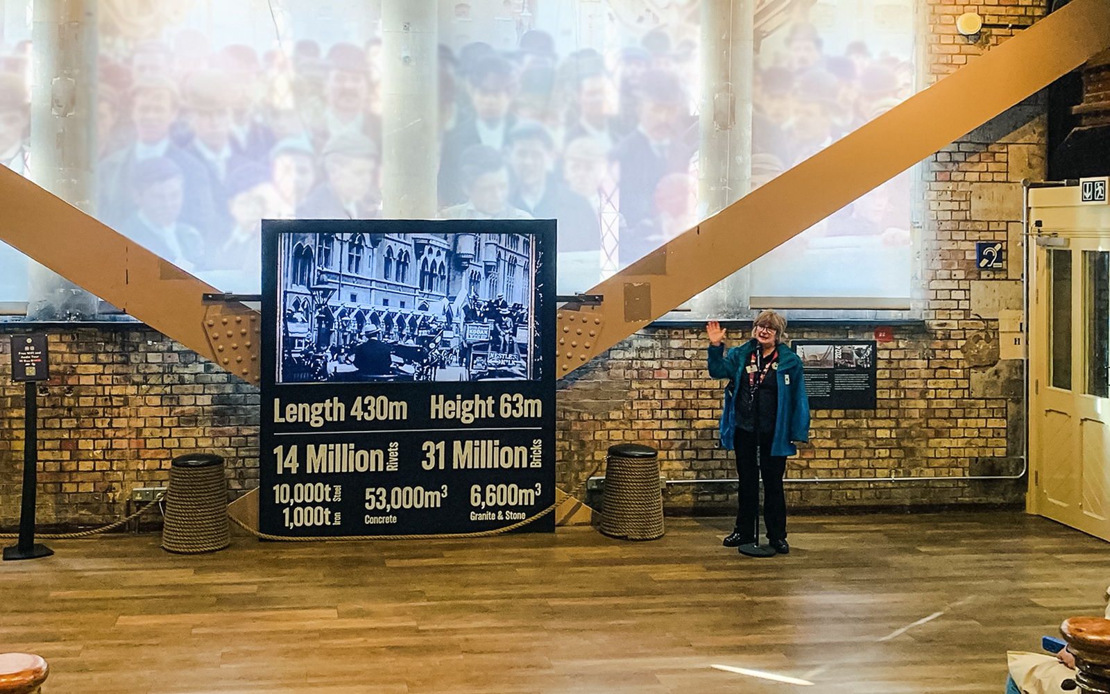 Guide presenting Tower Bridge exhibit details in London.