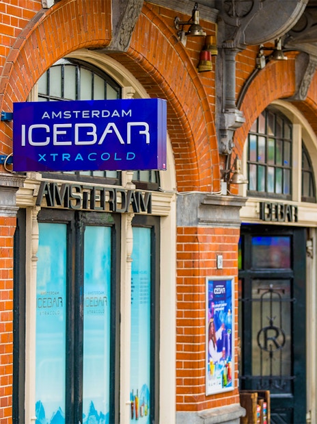 Amsterdam Icebar entrance with brick facade and signage.