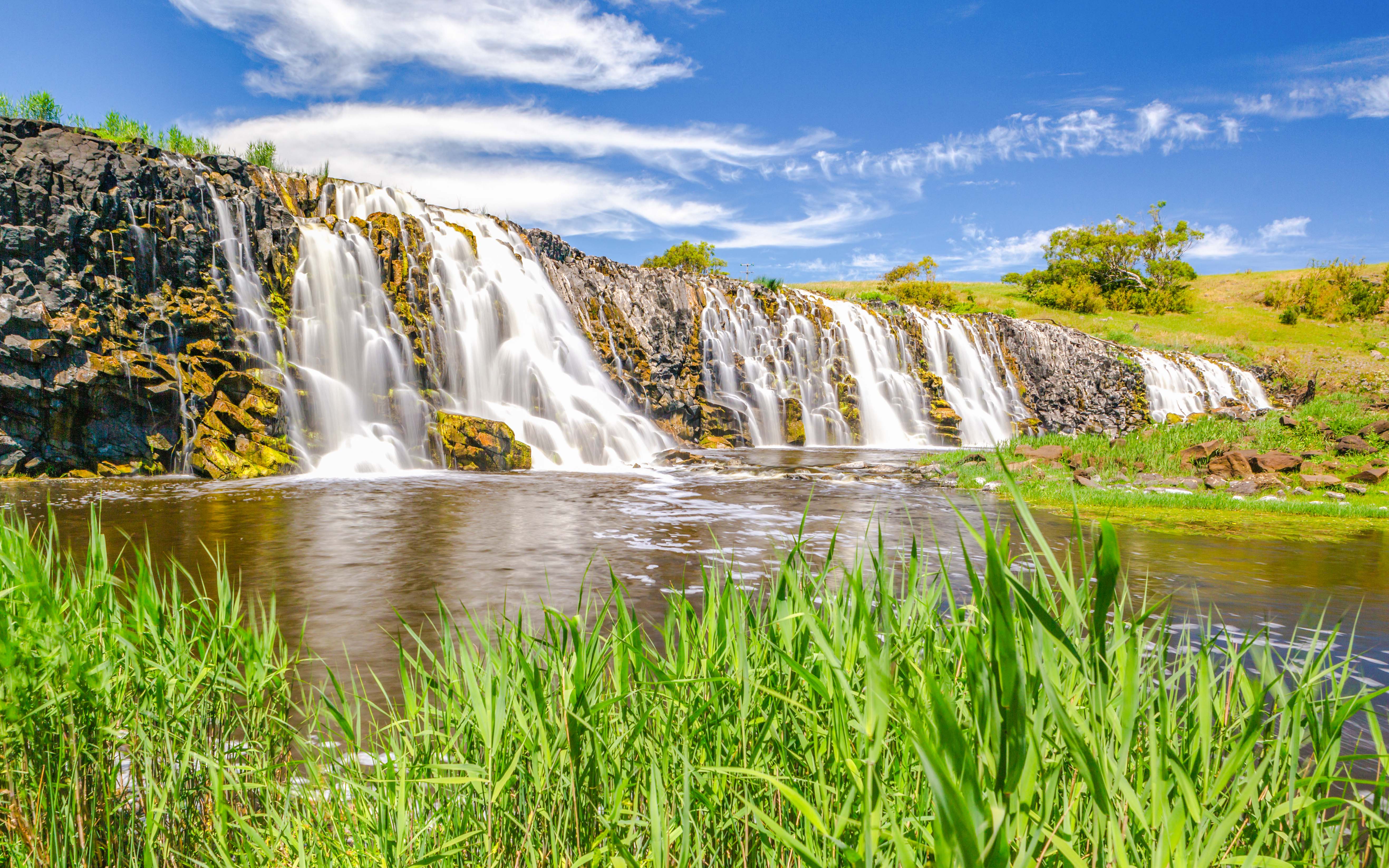 Hopkins Falls cascading over rocky terrain in Victoria, Australia.