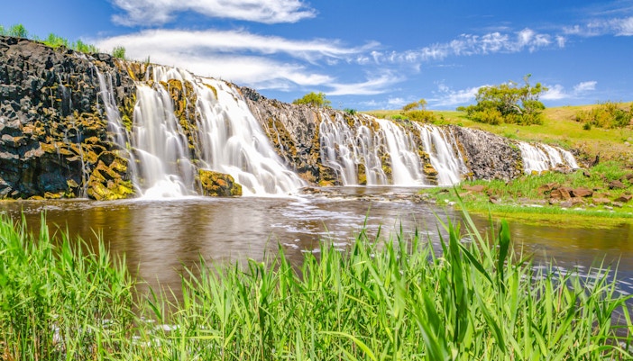 Hopkins Falls cascading over rocky terrain in Victoria, Australia.