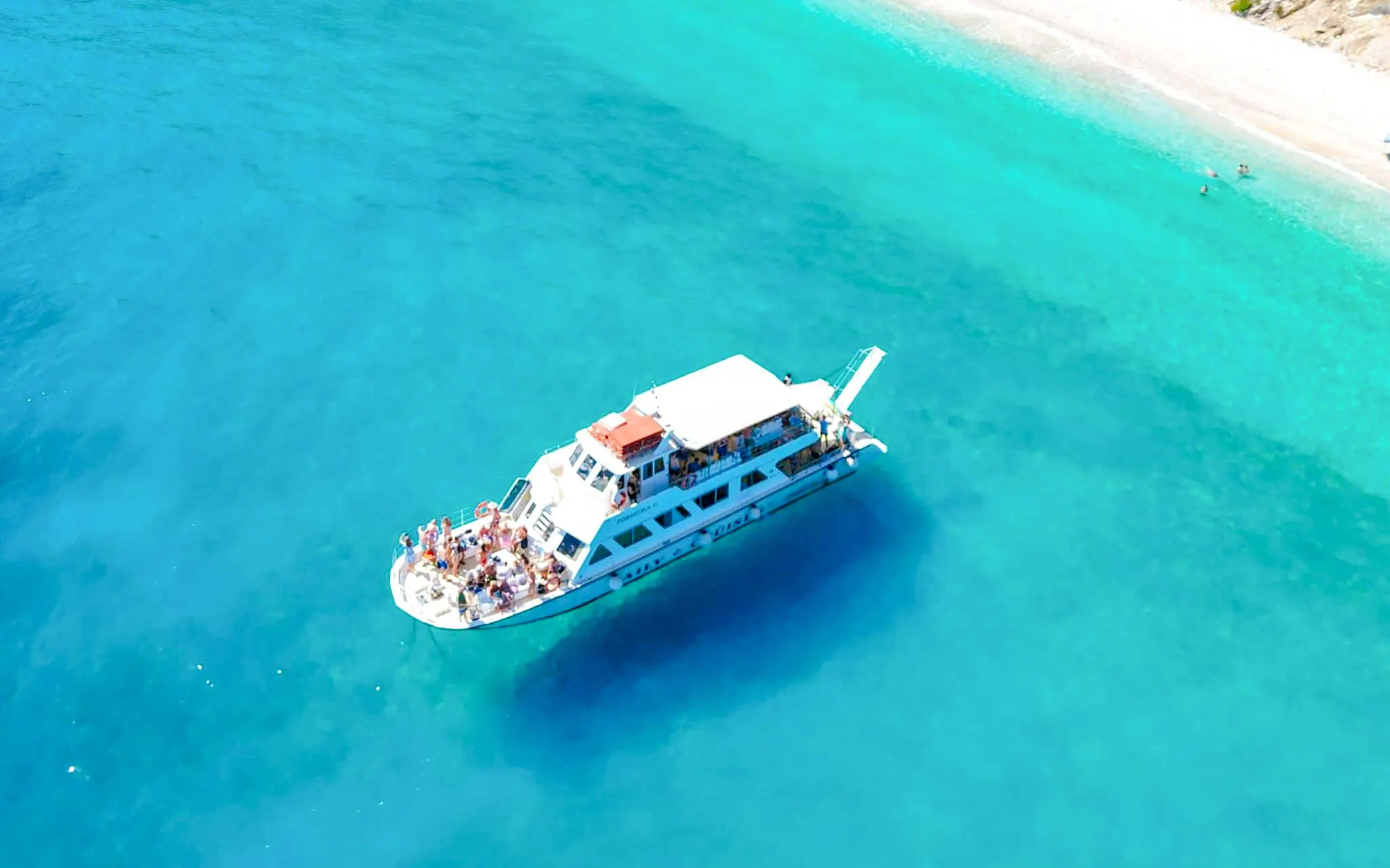 From Kefalonia: Ithaca Island Cruise with Swimming Stops and Transfers
