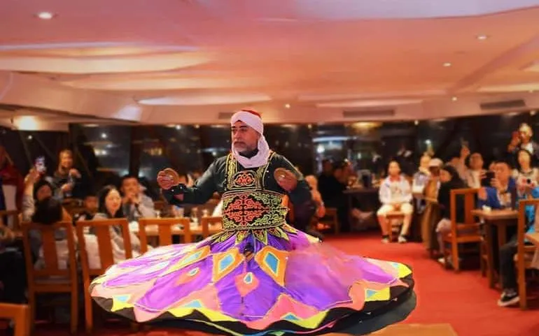 Cairo Nile Dinner Cruise with Buffet, Live Belly Dance, Tanoura Show, and Hotel Transfers Image 10
