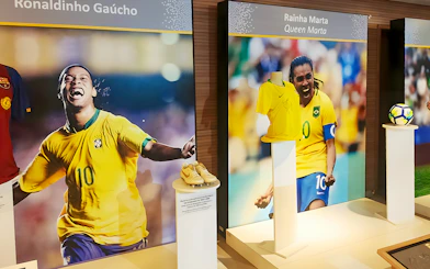Maracanã Stadium museum display featuring Brazilian football legends' memorabilia.