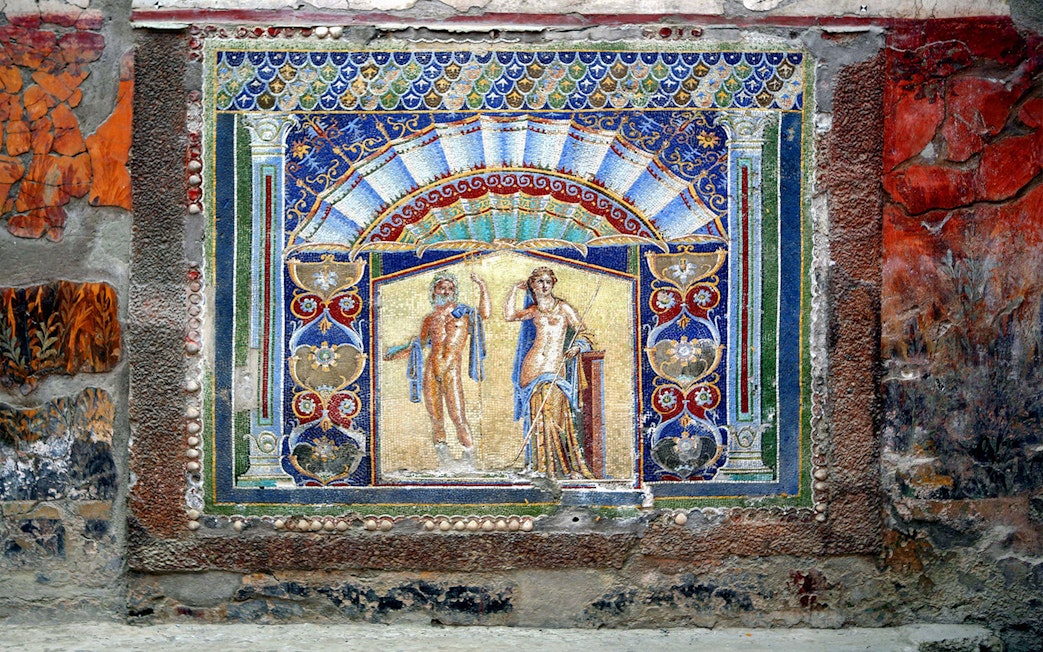Mosaic artwork depicting mythological figures in Herculaneum, Italy.