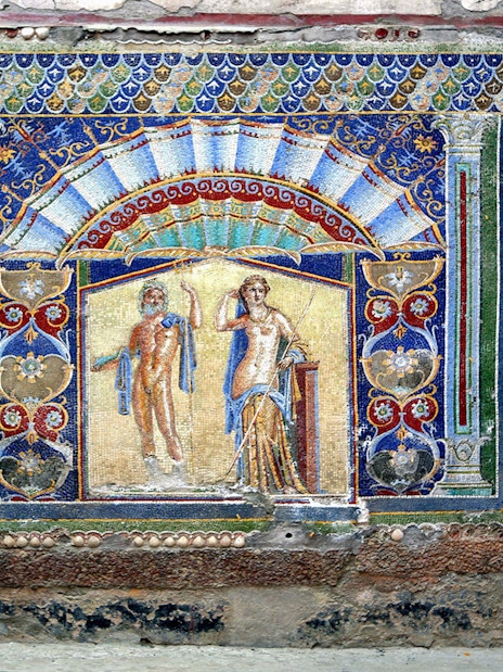 Mosaic artwork depicting mythological figures in Herculaneum, Italy.