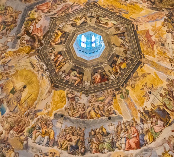 Frescoes inside Brunelleschi's Dome, Florence, depicting religious scenes and figures.