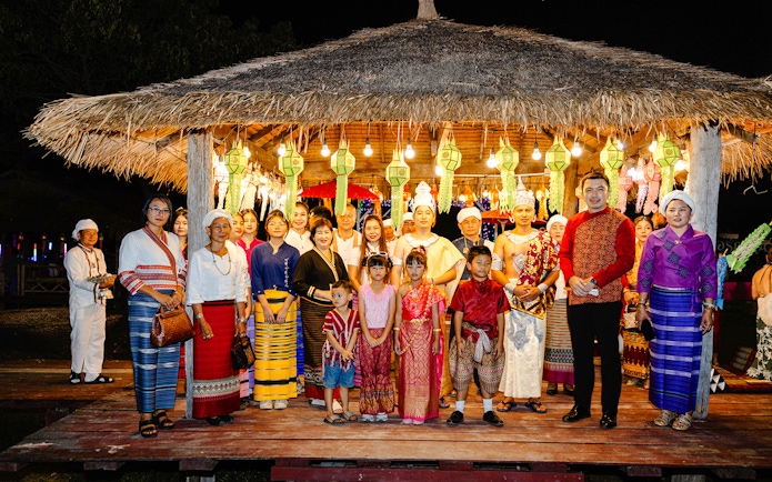 Locals and visitors in traditional attire at Yi Peng and Loy Krathong Festival, Chiang Mai 2025.