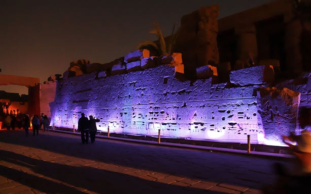 Karnak Temple illuminated during sound and light show, Luxor, Egypt.