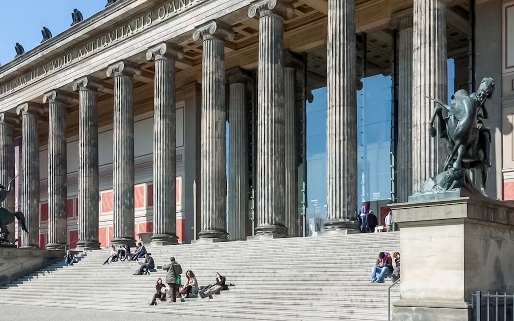 Altes Museum entrance with visitors on steps, Berlin.