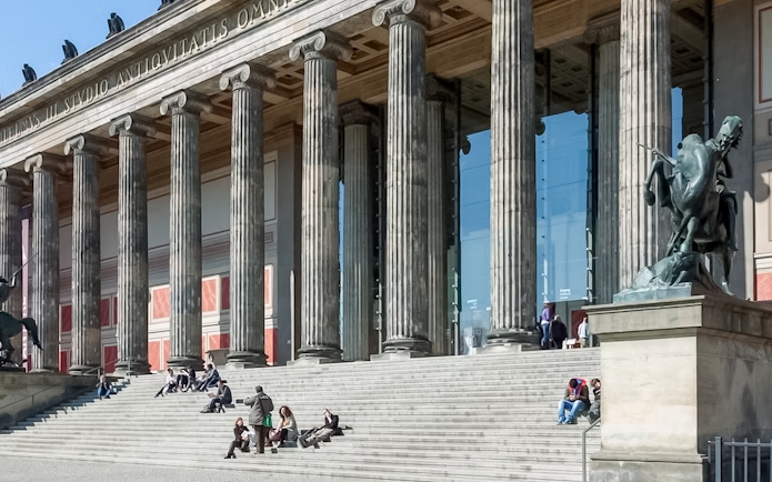 Altes Museum entrance with visitors on steps, Berlin.