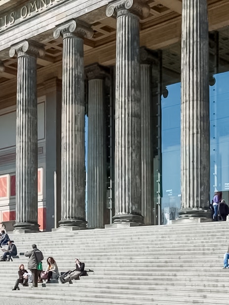 Altes Museum entrance with visitors on steps, Berlin.