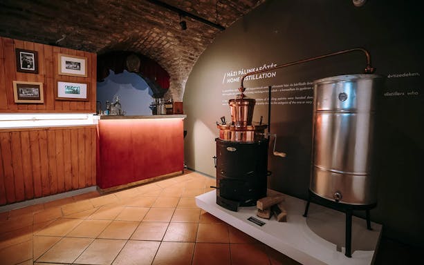 Pálinka distillation exhibit at Budapest Pálinka Museum.