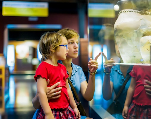 Visitor looking at Sculptures