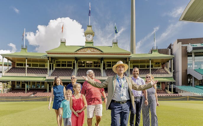 Sydney Cricket Ground with guided tour group exploring historic sports venue.