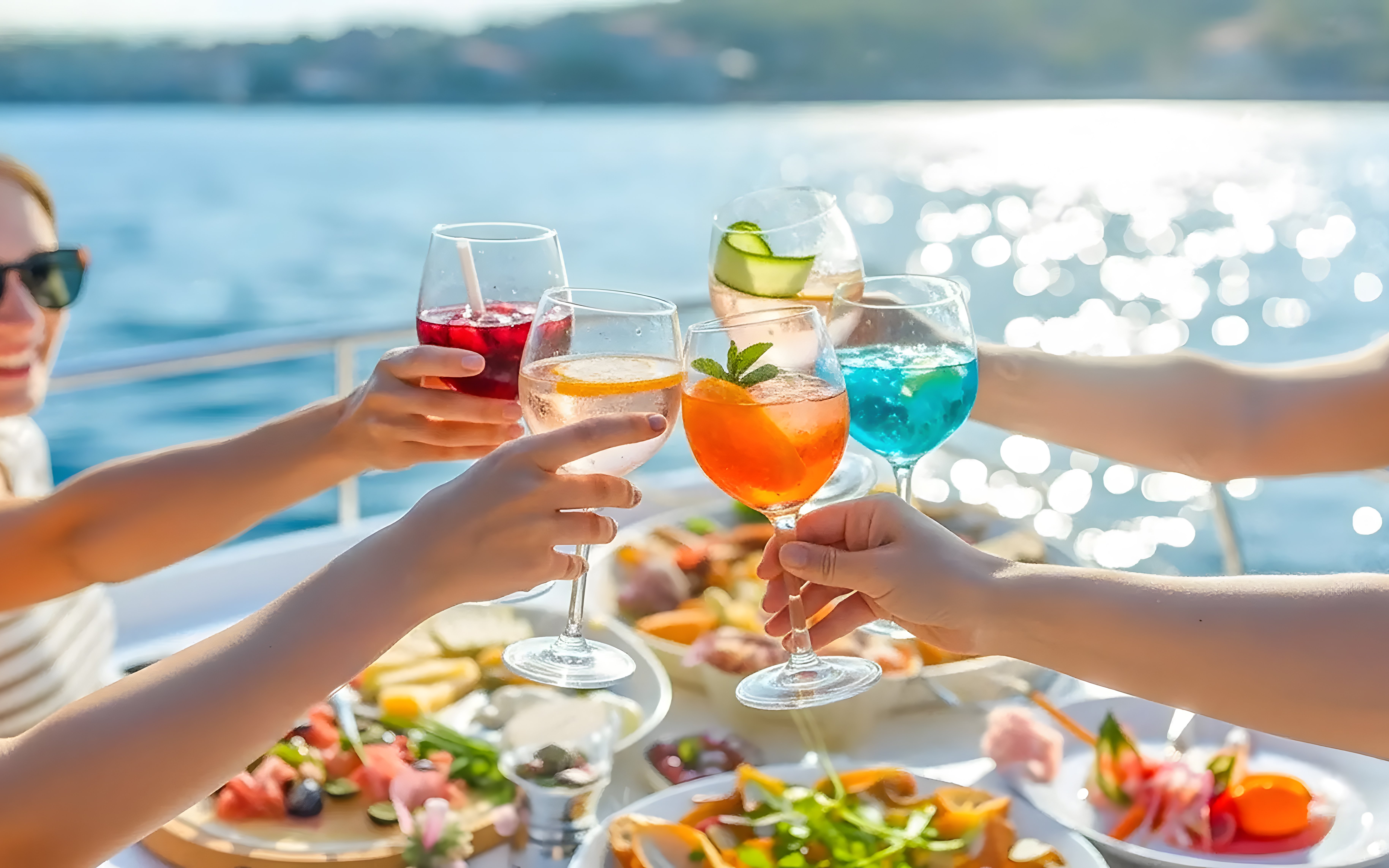Brunch and drinks on a boat during Benagil Caves tour.