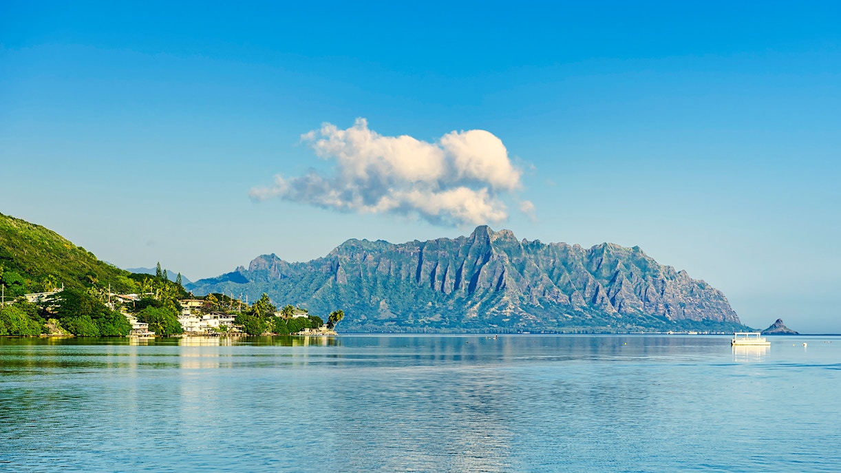 Kualoa Ranch mountain range and ocean view in Hawaii.